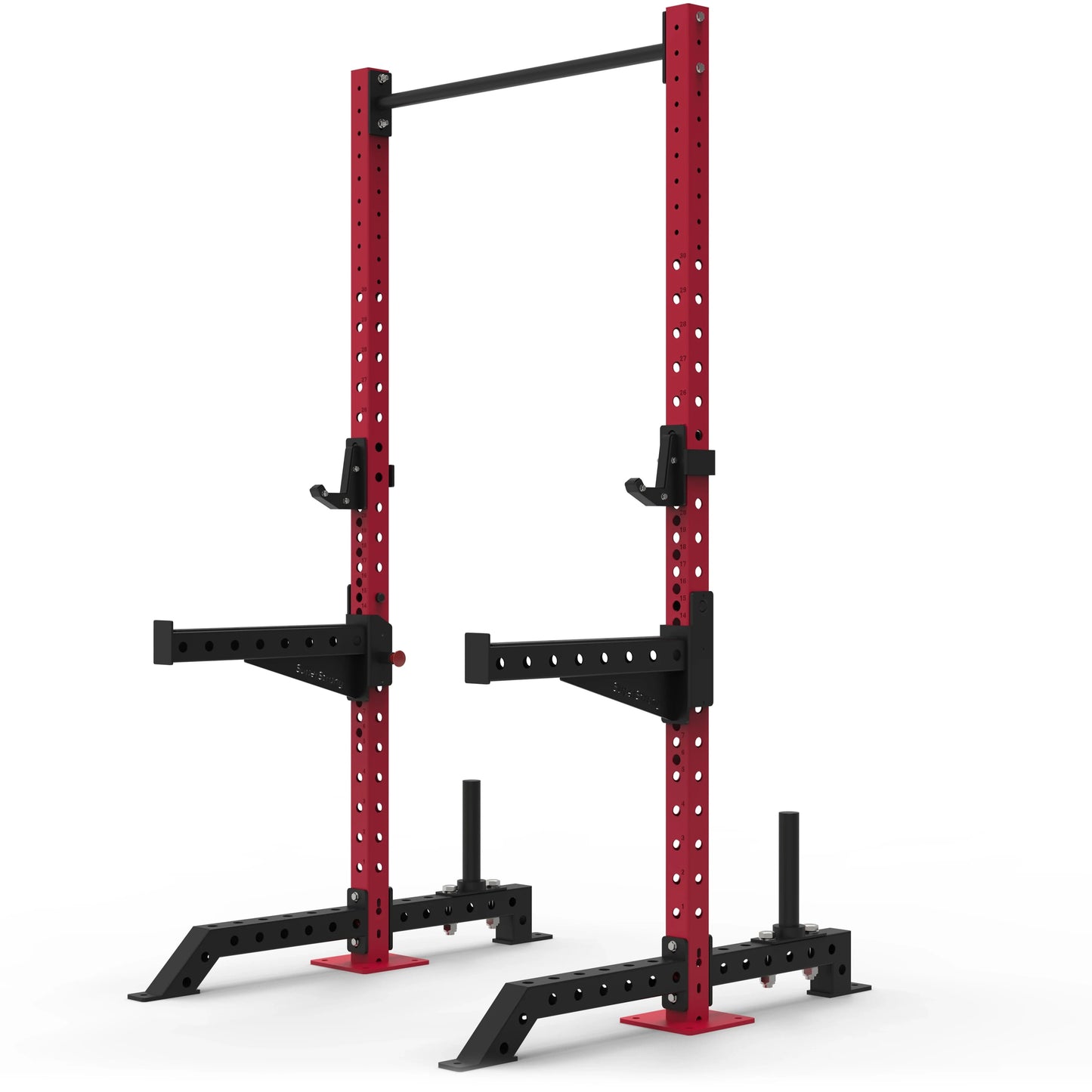 Red commercial squat rack with black spotter arms and the J-hooks on a white background.