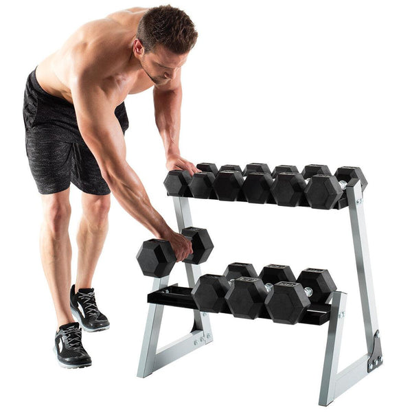 Man selecting weights from a weight rack