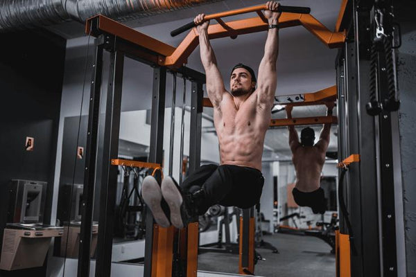 Man using a gym rig at home