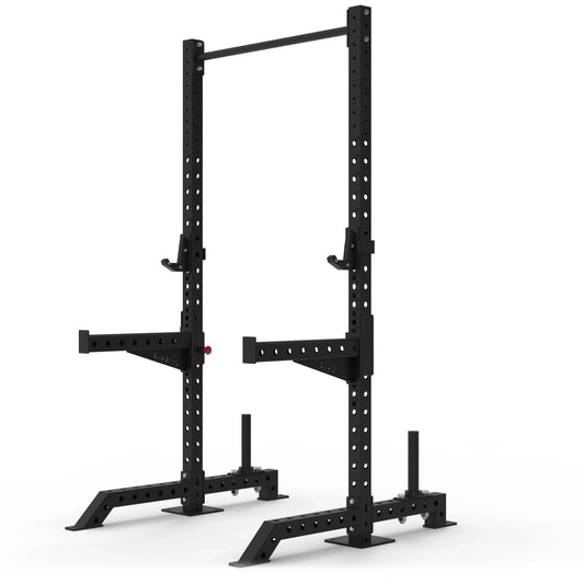 Black commercial squat rack on a white background.