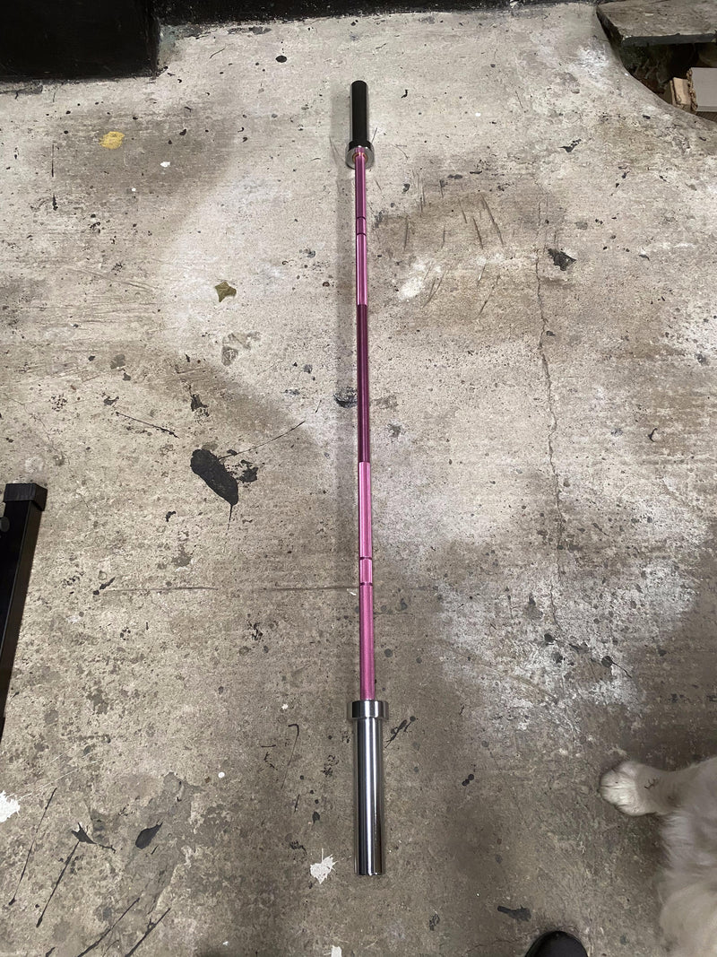 pink bar full length on garage floor