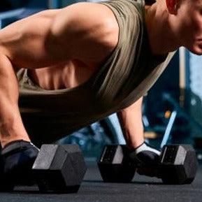 guy doing hex dumbbell push ups - superstrong